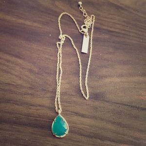 Kendra Scott gold necklace with green stone